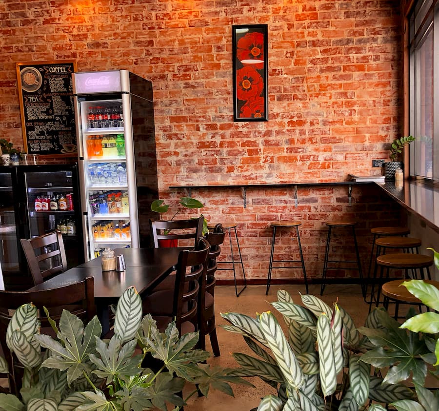 Part of our seating area. Grab a barstool at the window. Has a power socket and USB charging ports.