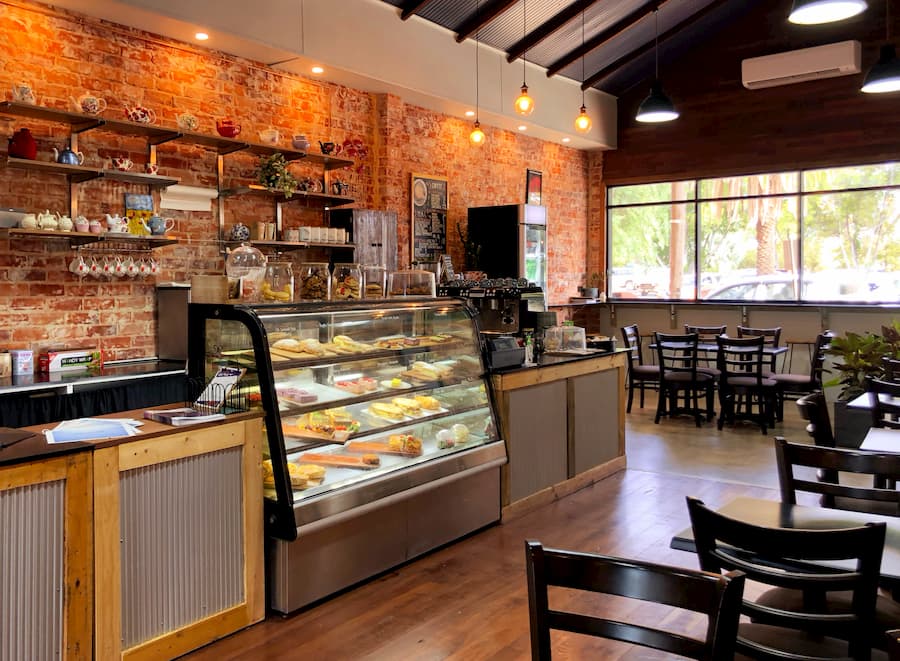 Refrigerated display with a selection of freshly made cakes, quiches, and more.